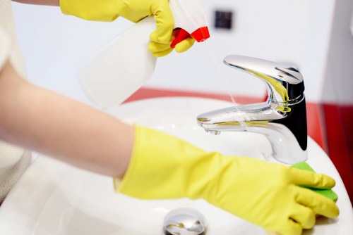 Technician preparing cleaning products and assessing site risks